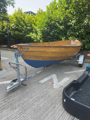 Lot 4257 - Wooden rowing boat with single-axle boat...