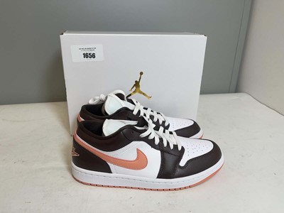 Lot 1899 - Nike Air Jordan 1 low trainers in white, boxed...