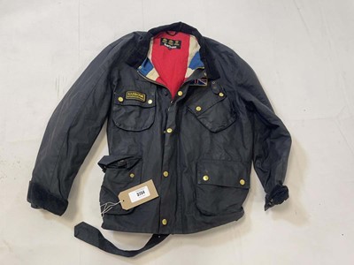 Lot 3734 - Barbour wax jacket in black size XXL (hanging)...