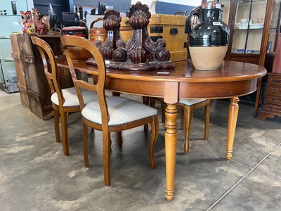 Lot 1060 - Yew oval extending dining table together with...