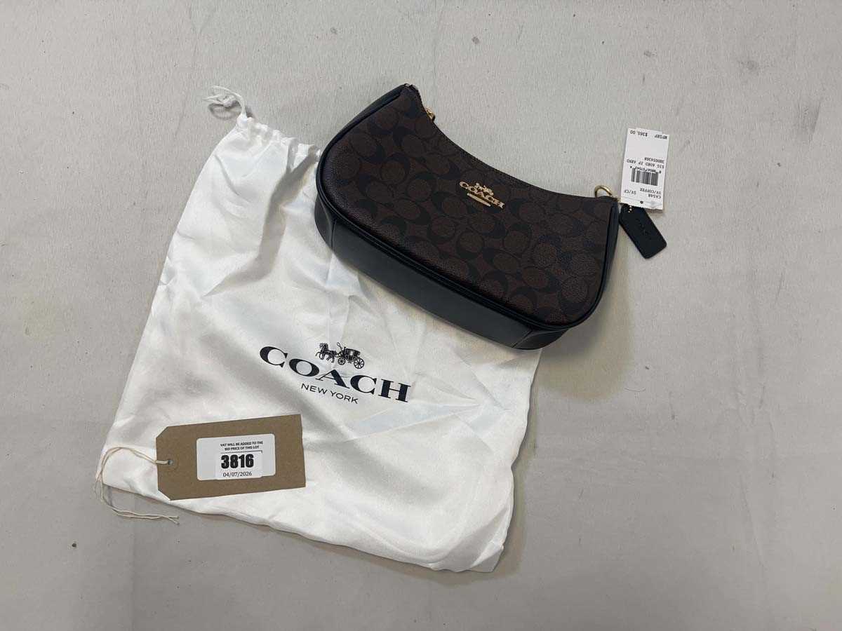 Lot 3816 - Coach New York zip around handbag in coffee...