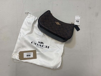 Lot 3816 - Coach New York zip around handbag in coffee...
