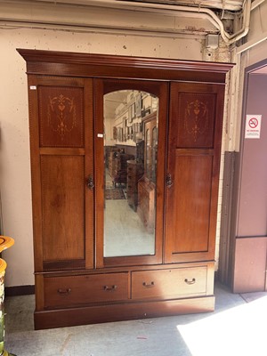 Lot 22 - A late Victorian mahogany and strung wardrobe,...