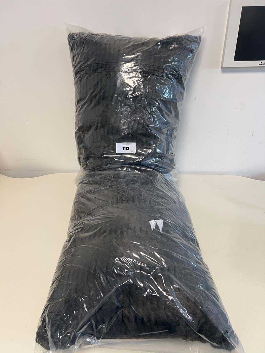 Lot 1113 - A Natalie faux fur grey body pillow.