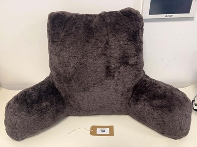 Lot 1133 - A brown faux fur reading pillow with arms