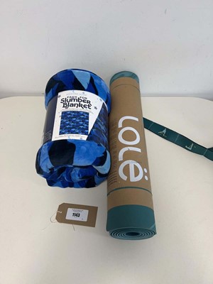 Lot 1143 - A Lole yoga mat and a Ashford Home faux fur...