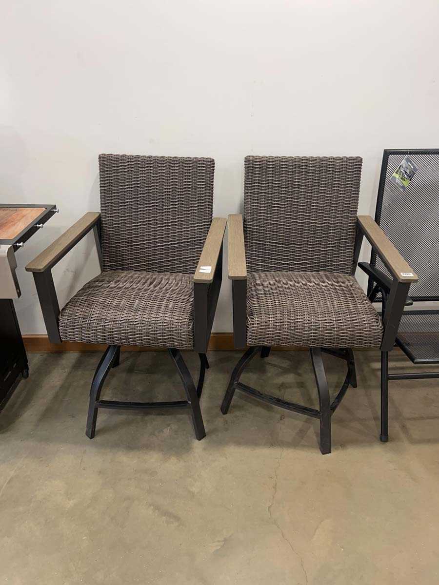 Lot 4205 - Set of 2 brown rattan swivel outdoor dining...