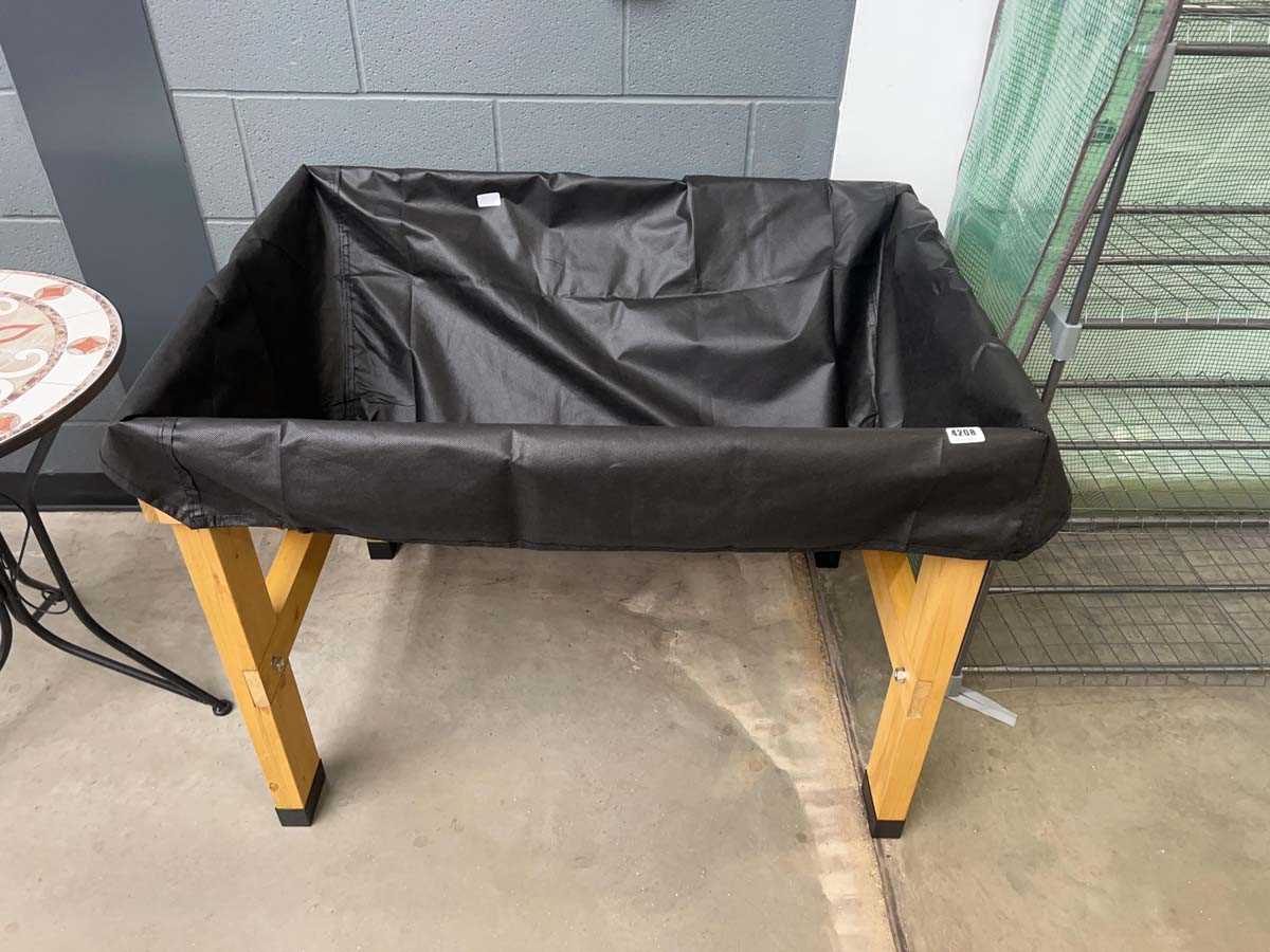 Lot 4208 - VegTrug wooden planter with black mesh lining
