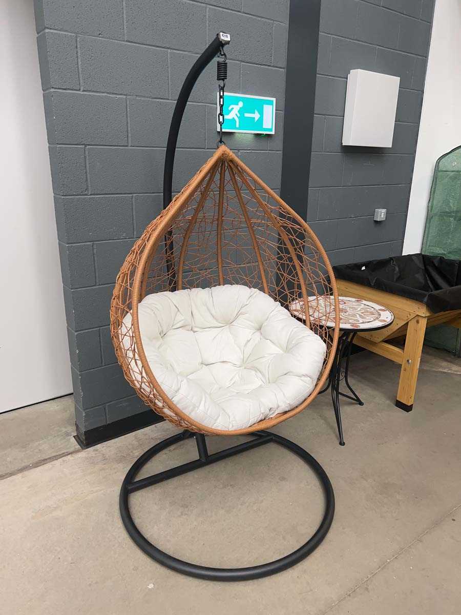 Lot 4210 - Wicker finish hanging egg chair with white...