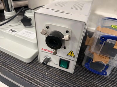 Lot 2059 - Laboratory microscope set; binocular stereo...