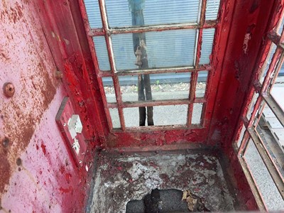 Lot 4234 - Vintage red telephone box plus a metal gate