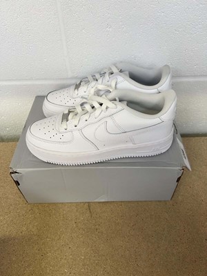 Lot 1246 - Boxed pair of Nike Air Force 1 trainers size...