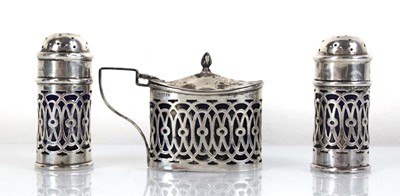 Lot 322 - An Edwardian silver three piece cruet set of...