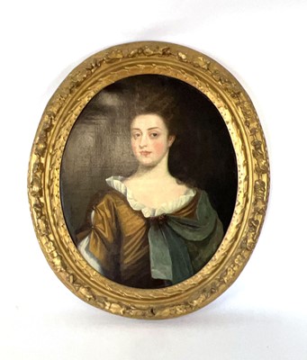 Lot 17th Century School, A half-length portrait of...