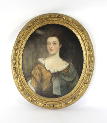 Lot 17th Century School, A half-length portrait of...