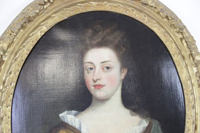 Lot 17th Century School, A half-length portrait of...
