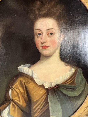 Lot 17th Century School, A half-length portrait of...