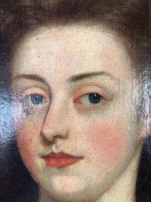 Lot 17th Century School, A half-length portrait of...