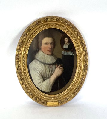 Lot 17th Century School, A half-length portrait of...