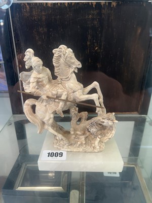 Lot 1009 - Carved ornament of St George defeating the...