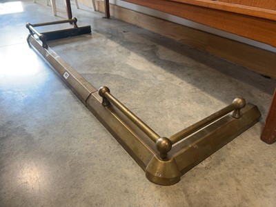 Lot 1022 - Extending brass fire fender