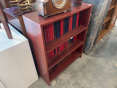 Lot 1036 - Wood effect bookcase and the contents of...