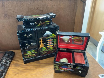 Lot 1043 - Black lacquer finish jewellery box with hand...