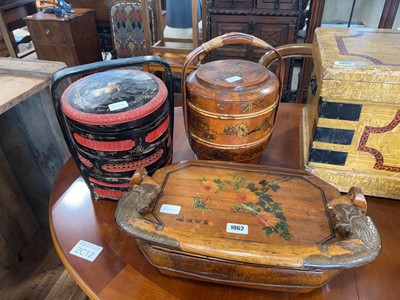 Lot 1062 - 2 oriental stackable food containers with hand...