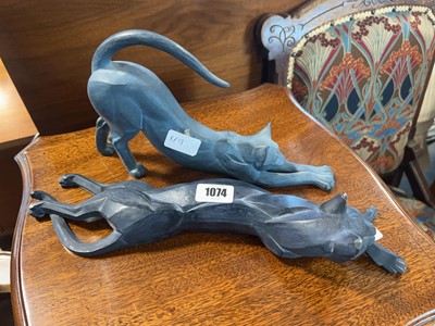 Lot 1074 - 2 cat ornaments