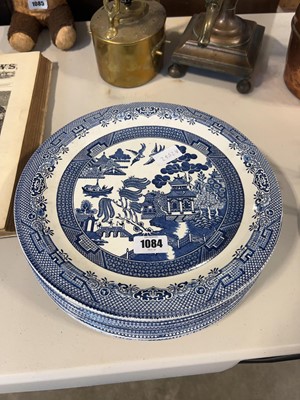 Lot 1084 - Stack of 8 Willow pattern plates by Churchill