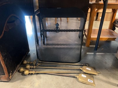 Lot 1088 - Fire fender and set of 4 brass fire tools