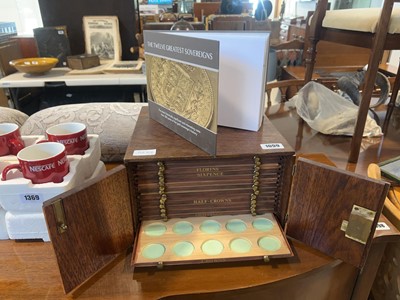 Lot 1099 - Coin collectors cabinet with book on theme of...