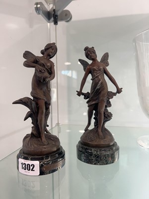 Lot 1302 - Pair of bronzed Nymph ornaments, each mounted...