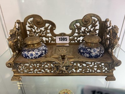 Lot 1305 - Ornate brass inkwell with pair of blue and...