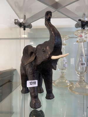Lot 1310 - Leather covered elephant ornament
