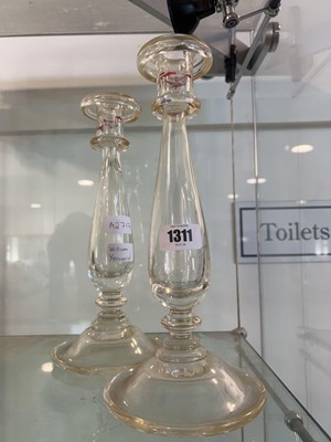 Lot 1311 - Pair of cylindrical glass candlesticks by...