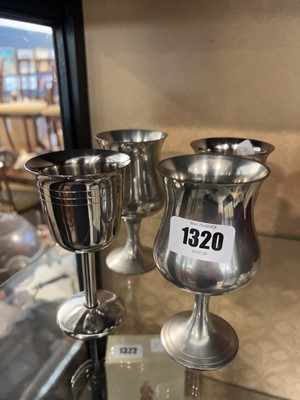 Lot 1320 - 4 stainless drinking goblets