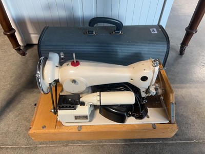 Lot 1362 - Electric operated Sew-Tric sewing machine in...