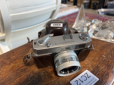 Lot 1363 - Vintage Minolta camera in brown leather case,...