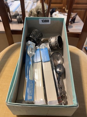 Lot 1380 - Small box containing silver plated spoons and...