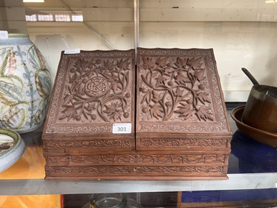 Lot 301 - An eastern carved desktop wooden box with drawer