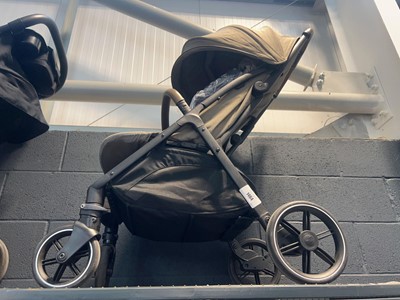 Lot 1464 - Joie folding buggy in brown