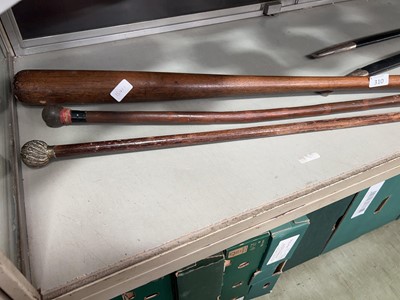 Lot 310 - A vintage mahogany baseball bat along with two...