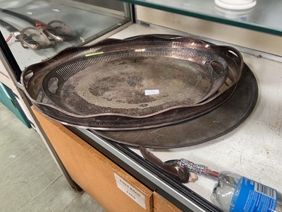 Lot 319 - An eastern embossed brass tray with dragon...