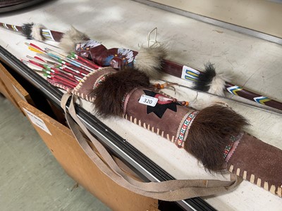 Lot 320 - A replica Native American style bow with...