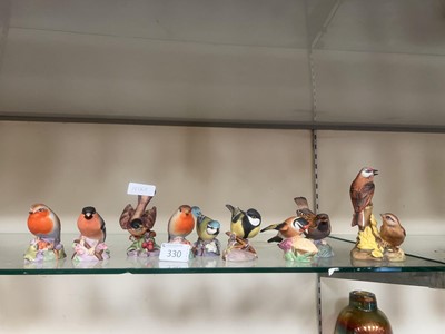 Lot 330 - Nine Royal Worcester figures of birds to...