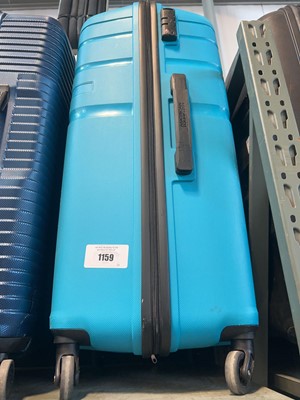 Lot 1159 - American Tourist wheeled luggage case in blue