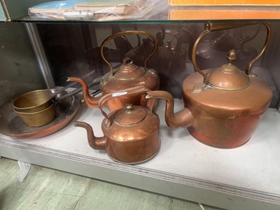 Lot 354 - Two brass and cast metal saucepans and a brass...