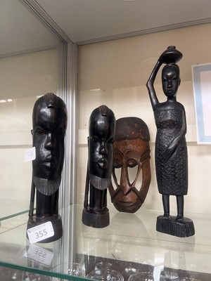 Lot 355 - An African carved wood mask and a carved...
