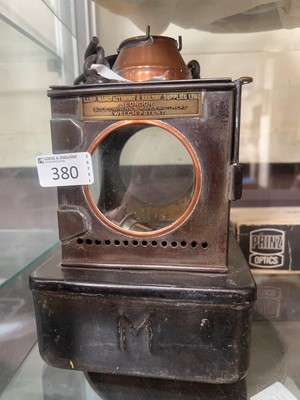 Lot 380 - A Welch patent railway lantern with brass plaque
